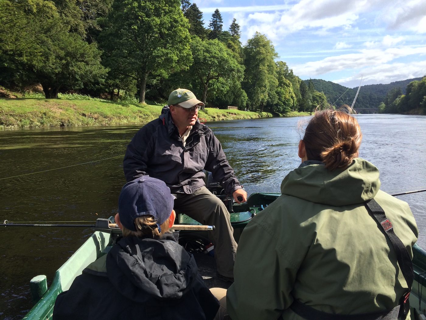 This mum and son salmon fishing tour team seen here with the boatman at Dunkeld were over for a few days of Scottish salmon fishing from Switzerland. The young boy Oscar actually hooked and landed a 12lbs salmon with his very first cast of a salmon rod the day prior much to the total amazement of Mum, me and young Oscar himself!