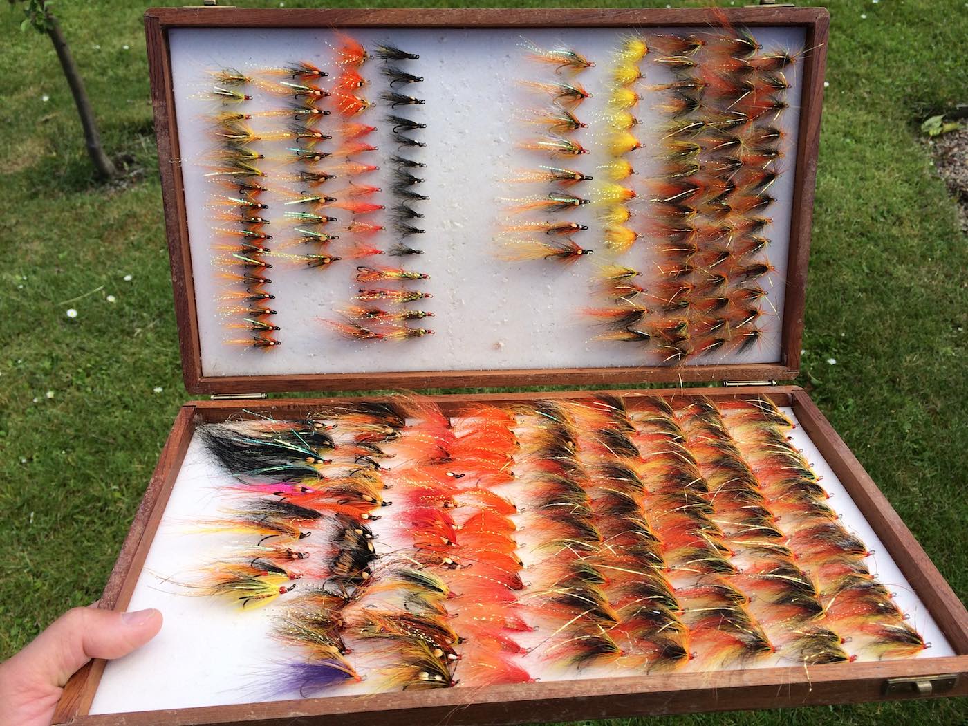 Here's a lovely well stocked salmon fly box containing a few highly effective salmon flies. It's good practice to sort out your fly boxes a few times every season and get your fly stock in good order like this. The predominant fly pattern that you see in this big fly box is the Monteith 'Copperass' pattern which is a particularly effective salmon fly which I designed while working on the Tay as a professional salmon guide.