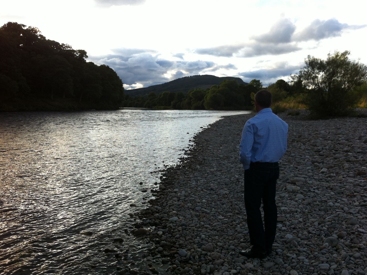 Here's a photograph of myself out surveying the Meetings Pool on the Lower Kinnaird salmon beat of the River Tay at dusk. As a professional salmon guide I always like to watch the river during the last hour of daylight for any signs of salmon movement.