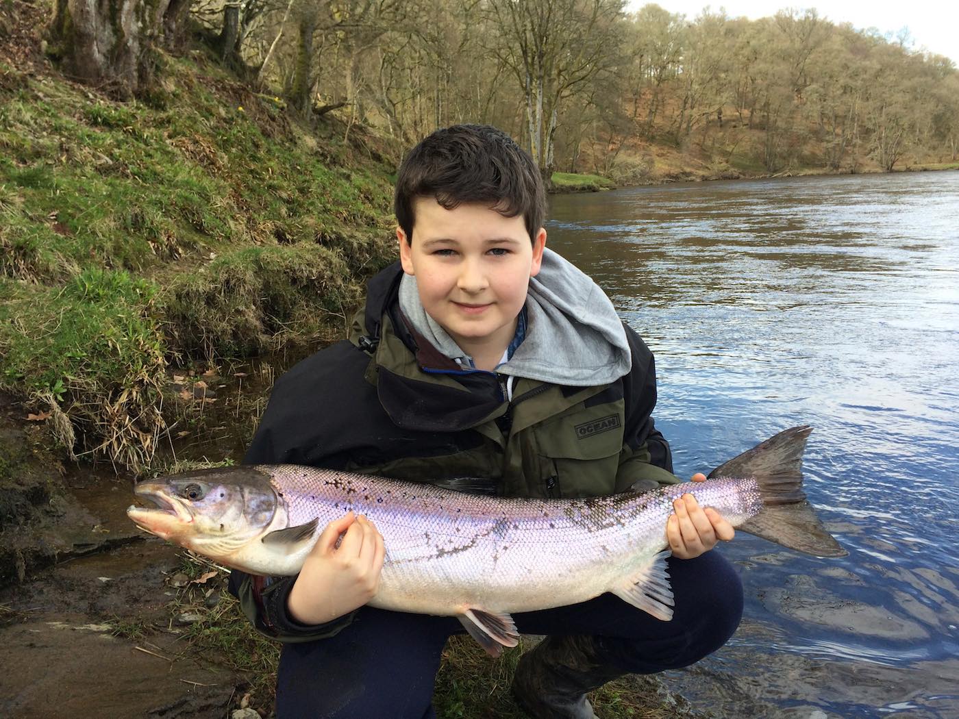 Here's young Johnny Monteith with a perfect Spring salmon which he caught at the Rock Pool on the Upper Kinnaird salmon beat while under my instruction as his father and his salmon fishing guide. This Spring fish was caught during low water in April and was quickly returned to the river.