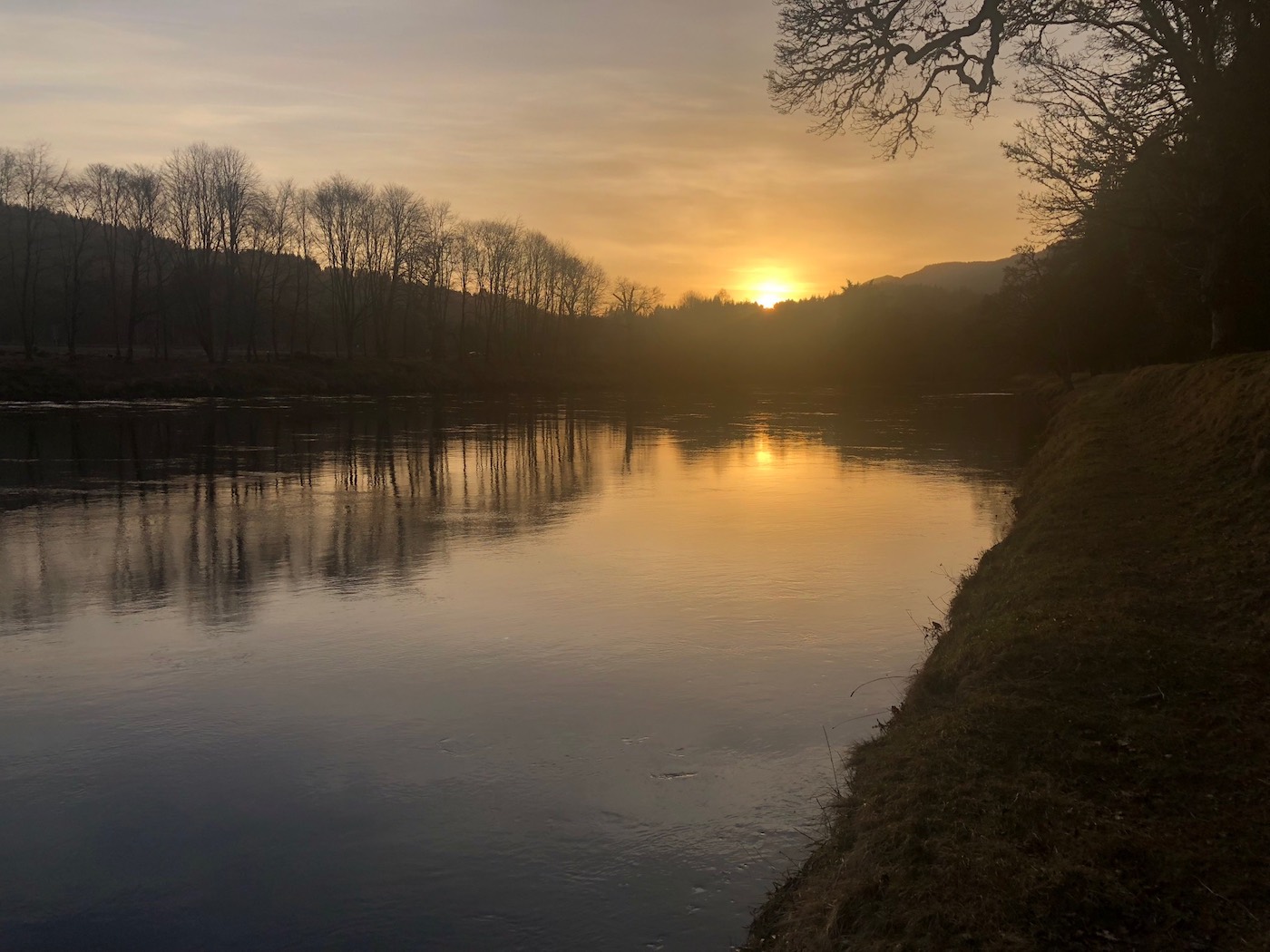 Here's a lovely sunset at Dunkeld on the River Tay. It's always nice to fish the Tay for salmon right up to this special time of the fishing day and often salmon will move as the light starts to fade so there's always a fair chance of a fish in addition to this beautiful natural light show. You can see this shot was taken during early Spring before the leaves appear on the riverbank trees.