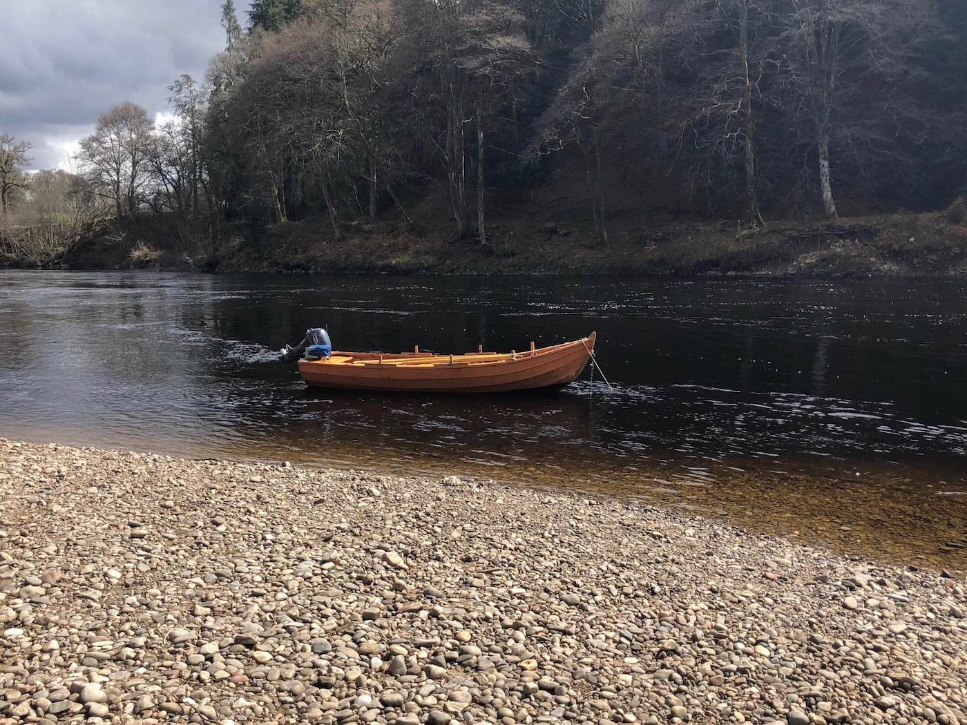 Here's a hand made work of art known as a River Tay 'coble' salmon fishing boat. This one was made by master boat builder John Ferguson of Stanley who's been making boats like this for 50 years for all of the River Tay salmon beats. Our Tay salmon guides utilise these fine boats to get our salmon fishing holiday guests closer to the long distance salmon holding areas.
