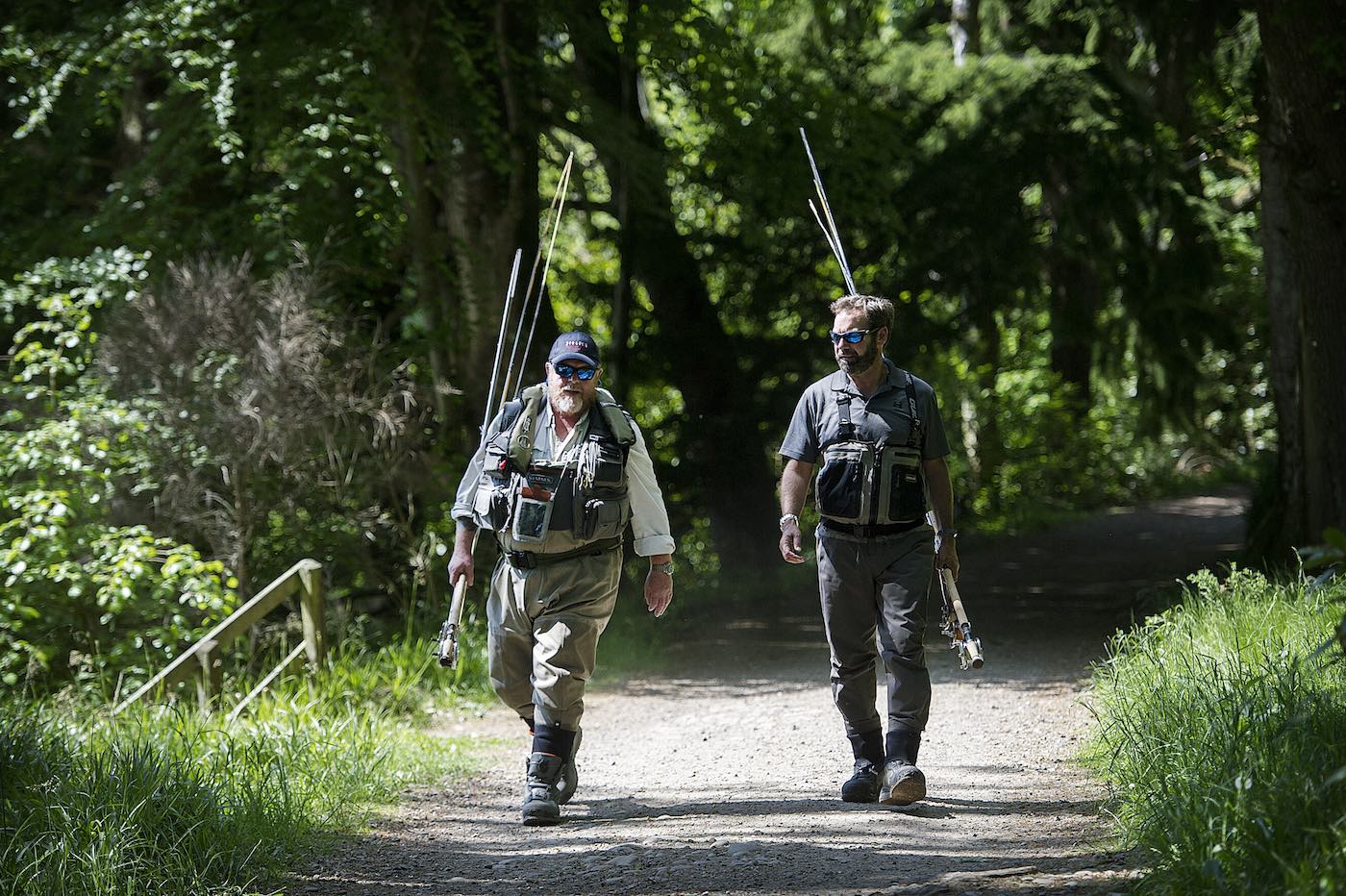 These 2 River Tay salmon fishers have become great friends after meeting on the salmon river 20 years previously. The salmon rivers of Scotland are great meeting places for people with the same fascinating salmon fishing obsession. This photo of these 2 great salmon fishing buddies was taken on the Dunkeld House Beat during the Summer.