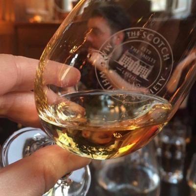 With many malt whisky distilleries spread across the glens of Scotland whisky tours & whisky tasting is big business in the tourism sector. Here's some whisky tasting taking place.