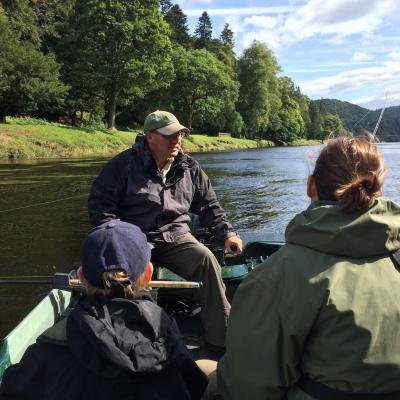 This mum and son salmon fishing tour team seen here with the boatman at Dunkeld were over for a few days of Scottish salmon fishing from Switzerland. The young boy Oscar actually hooked and landed a 12lbs salmon with his very first cast of a salmon rod the day prior much to the total amazement of Mum, me and young Oscar himself!