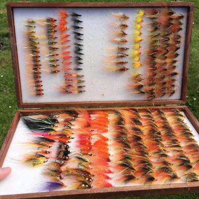 Here's a lovely well stocked salmon fly box containing a few highly effective salmon flies. It's good practice to sort out your fly boxes a few times every season and get your fly stock in good order like this. The predominant fly pattern that you see in this big fly box is the Monteith 'Copperass' pattern which is a particularly effective salmon fly which I designed while working on the Tay as a professional salmon guide.