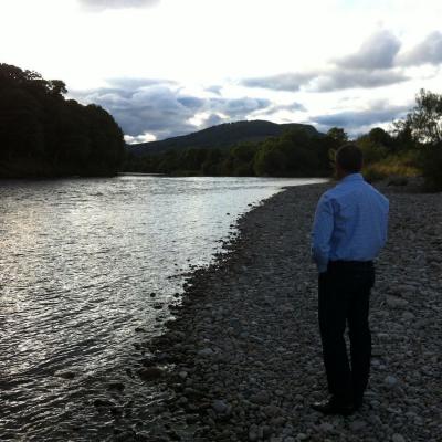 Here's a photograph of myself out surveying the Meetings Pool on the Lower Kinnaird salmon beat of the River Tay at dusk. As a professional salmon guide I always like to watch the river during the last hour of daylight for any signs of salmon movement.