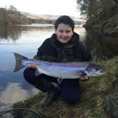 Here's Johnny Monteith with another fine Spring salmon which he hooked opposite the sand bank at the Upper Kinnaird Beat's Rock Pool during April. This perfect salmon weighed 14lbs and took an ABU Toby silver & copper coloured spinning lure which was selected and tied on by his professional salmon guide.