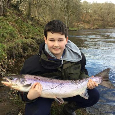 Here's young Johnny Monteith with a perfect Spring salmon which he caught at the Rock Pool on the Upper Kinnaird salmon beat while under my instruction as his father and his salmon fishing guide. This Spring fish was caught during low water in April and was quickly returned to the river.