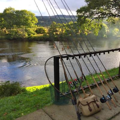 Here's all of the days fishing kit laid out waiting for the fishing guests to arrive on the River Tay near Dunkeld. You can see there's both fly rods and spinning rods in addition to a big McLean salmon landing net and Brady fishing bag full of lures, flies and other important salmon fly fishing accessories.