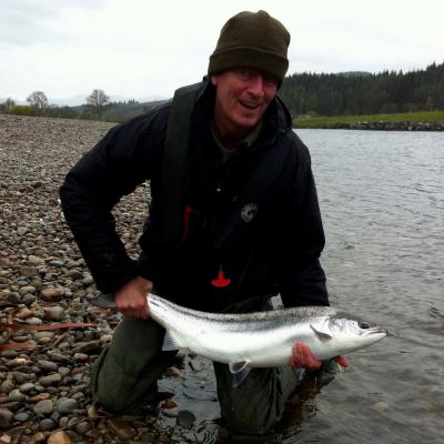 This fine Spring salmon was caught in the Guay Pool on Lower Kinnaird during a light snow storm in early Spring. This was a perfect end result for the fishing effort on a cold and wet Spring morning as you can see in this cold day shot. This guest came from Ireland and booked me as his salmon guide and although the weather wasn't kind the salmon fishing objective was clearly achieved.