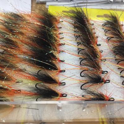 This salmon fly pattern is the 'Cascade' with boar bristle tied into them which make this pattern even more effective. The hooks these flies are tied on are black Partridge Salar doubles in size 9 which is a popular hook size for most water conditions. This pattern is a favourite for professional Scottish salmon fishing guide to use.