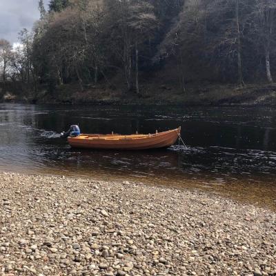 Here's a hand made work of art known as a River Tay 'coble' salmon fishing boat. This one was made by master boat builder John Ferguson of Stanley who's been making boats like this for 50 years for all of the River Tay salmon beats. Our Tay salmon guides utilise these fine boats to get our salmon fishing holiday guests closer to the long distance salmon holding areas.