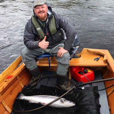 The traditional River Tay salmon fishing boats are exceptionally productive during the higher water levels of early Spring as this fortunate salmon fisher found out at Dunkeld. The boat allows for a slower salmon lure to be fished which is a great cold water presentation tactic which resulted in the capture of this heavyweight salmon. You can see the salmon in the landing net prior to being released back to the river.