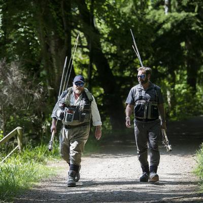 These 2 River Tay salmon fishers have become great friends after meeting on the salmon river 20 years previously. The salmon rivers of Scotland are great meeting places for people with the same fascinating salmon fishing obsession. This photo of these 2 great salmon fishing buddies was taken on the Dunkeld House Beat during the Summer.
