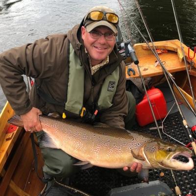 Here's one of the River Tay ghillies with a big coloured cock salmon that was captured near Dunkeld during September. Many big salmon like this enter the Tay during the Autumn high water months so there's always a fair chance of our salmon fishing guides connecting our salmon fishing trip guests with one of these fine specimens.