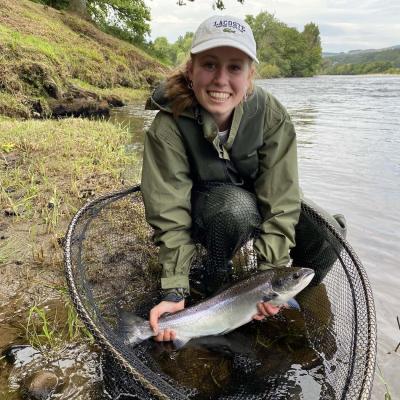 Wearing a life jacket should always be a mandatory piece of salmon fishing kit as you can see here on this lady salmon fishing guest. There's always an element of danger while wading in a river so let common sense prevail. You can see this perfect Summer River Tay salmon in the landing net at the March Pool on the Kinnaird salmon beat near Dunkeld. I took this shot as I was serving as this guest's salmon fishing guide that day.