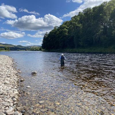Look for unusual riverbank markers like a pile of stones as sometimes these are placed there by anglers to mark the location of salmon that have been showing. This shot was taken on the Meetings Pool of the River Tay near the Perthshire town of Pitlochry which is a popular salmon fishing location for anglers.