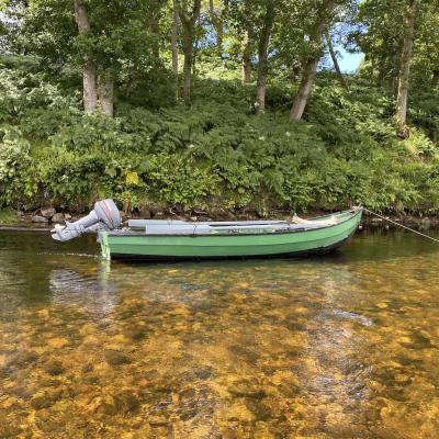 Here's a 16ft River Tay salmon fishing coble constructed from larch and oak. These traditional salmon boats are very stable yet can navigate shallow water when required. I've spent years out in this style of River Tay boat and enjoyed the capture of many salmon while boat fishing. This is one of the Kinnaird Beat boats on the River Tay near Pitlochry in Highland Perthshire.