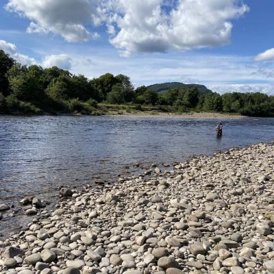 This salmon fisher had just been taught how to use a double handed salmon fly rod and had just started to fly fish unassisted in his chest waders when I took this shot on the Mike's Run Pool of the River Tummel.