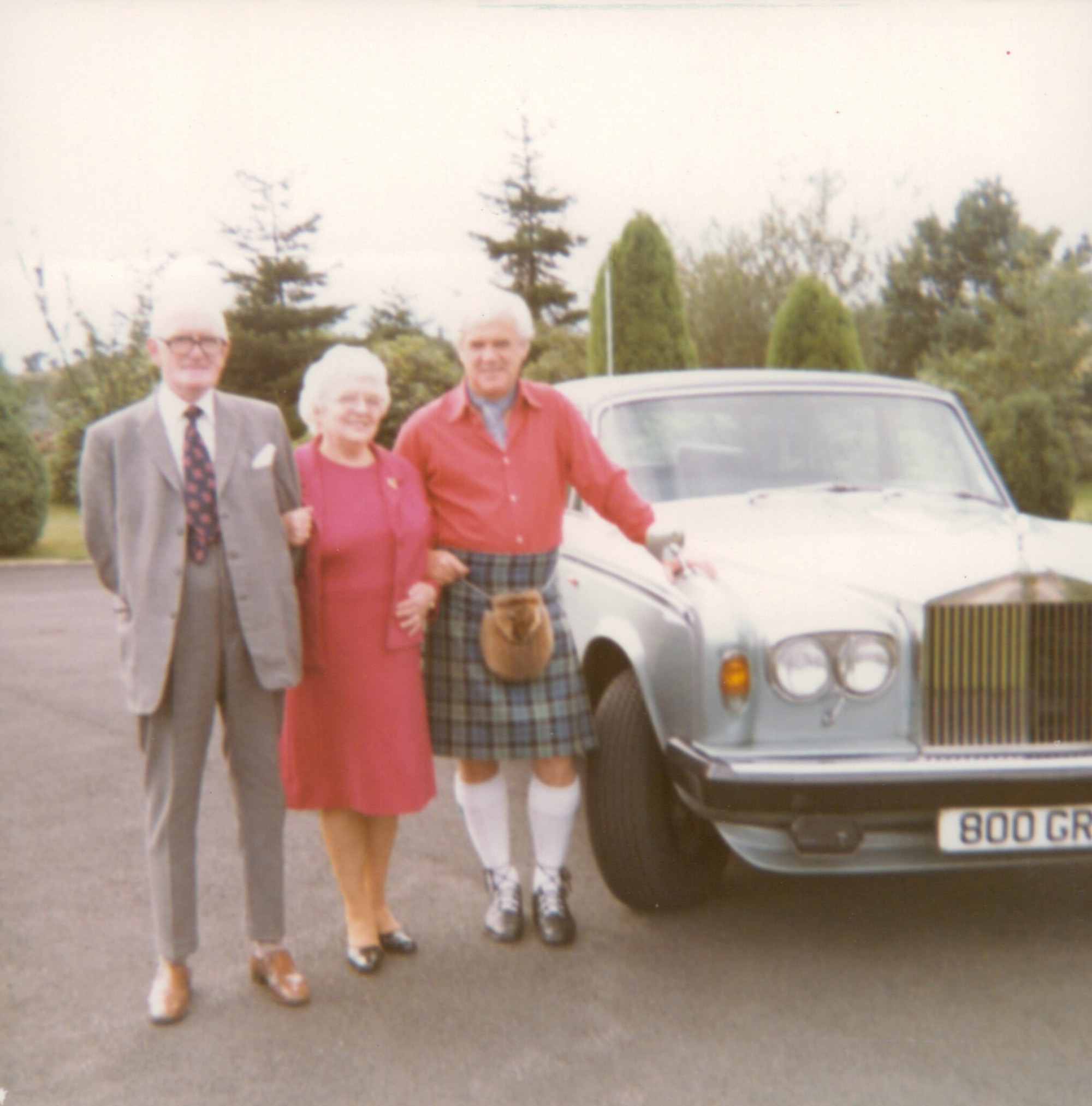 Kilted Scottish entrepreneur Donald A Monteith with his mother and father with Rolls Royce Silver Shadow (800 GRM) outside his home Dalvey House (now Bracken House) on the Old Mugdock Road in Strathblane, Stirlingshire, Scotland. Donald was one of Scotland's best known Glasgow based businessmen throughout the 1960's & 1970's era.