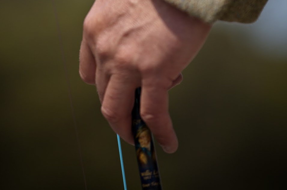 If you look closely between my fingers you'll see the carefully positioned Willie 'the ghillie' Laird lucky charm on my Monteith salmon fly rod. This lucky charm works well for me and it always pays to be aligned with the spirit world while fishing for salmon in Scotland.