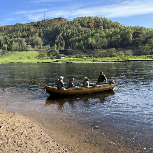 I took this shot of a boat load of visiting salmon fishers being brought back over to the fishing hut  for their lunch on the River Tay near Birnam. The boats on this beat have been kept on this sandy riverbank for over 60 years. You can see the boathouse on the far riverbank which I built in 2007 while I was working on this Tay salmon beat as the Head Ghillie.