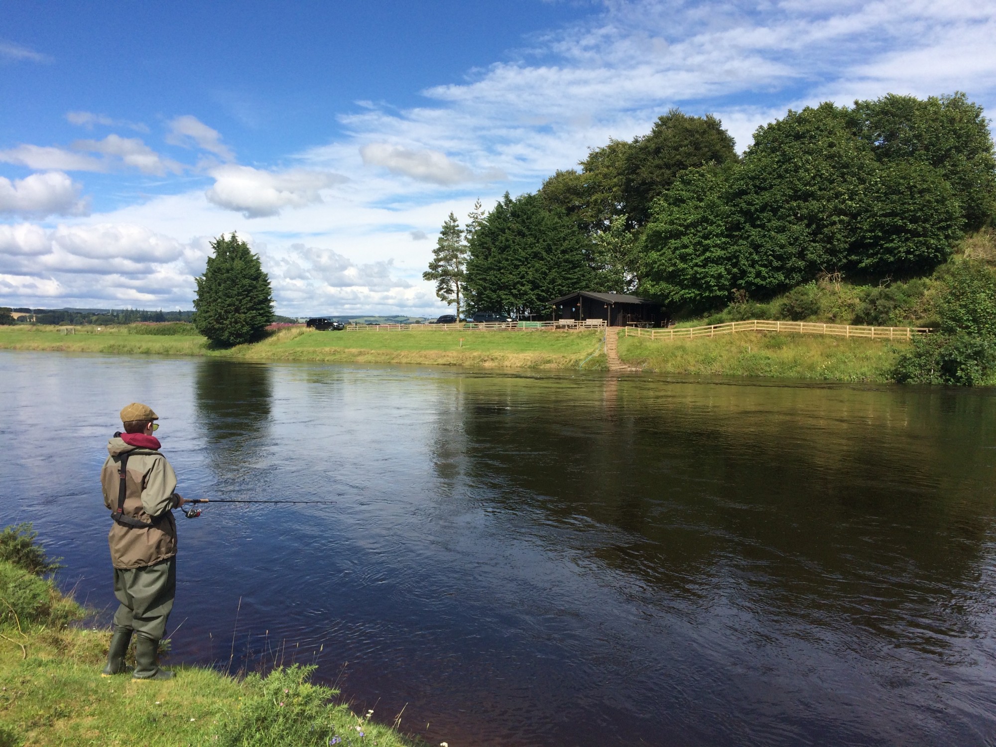 Here's a nice spin fishing shot I took of salmon fishing guest on the River Tay having a serious attempt at catching a salmon while on his fishing break. This slow moving deep pool near the village of Stanley is a great fishing area on the Tay. You can see the salmon fishing hut tucked in below the trees on the far side of the river.