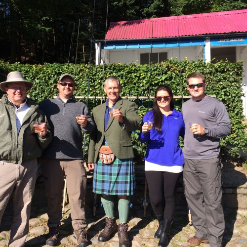 Here's a few salmon fishers with myself in my kilt in front of the famous Newtyle Beat fishing hut enjoying a lunchtime malt whisky. A quality malt whisky always tastes even better when consumed outdoors in the fresh Scottish air. Look at the perfectly cut beech hedge in front of the fishing hut.