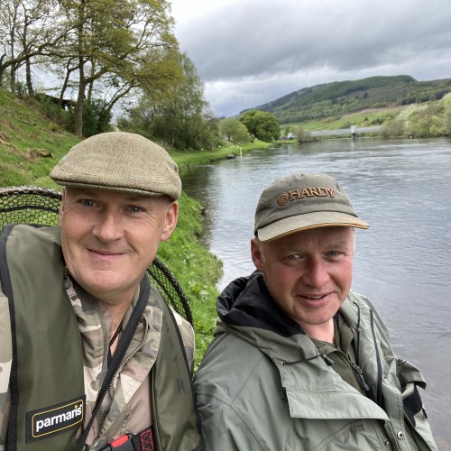Here's a great fishing guide colleague of mine Kevin McKay with me on the River Tay at the Upper Kinnaird salmon beat near Logierait in Perthshire. Kevin is a highly skilled River Tay salmon fisher & Tay boatman. In the distance you can see the old Logierait Railway Bridge.