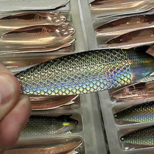 Here's a factory shot showing a fantastic batch of these perfectly designed 'Copper Sprat' salmon spin fishing lures. The replication of the North Sea Sprat's 'live' scale pattern can be clearly seen here on the outside of the lure. Copper has always been Jock Monteith's go to salmon lure colour making this combination an educated salmon lure combination from one of Scotland's most experienced professional salmon fishing specialists.