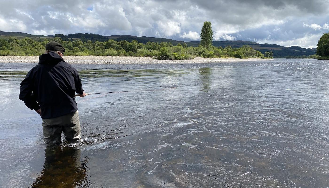 This shot was taken on the River Tay near Pitlochry during the Summer while I was the salmon guide for this fishing trip fisherman. Many anglers think salmon fishing is mainly about how well they can cast a fly but the truth of the matter is that the important thing to learn is how to move properly between each cast of the fly as that's logically what will place your fly in front of a cooperating salmon if your water coverage is good enough.